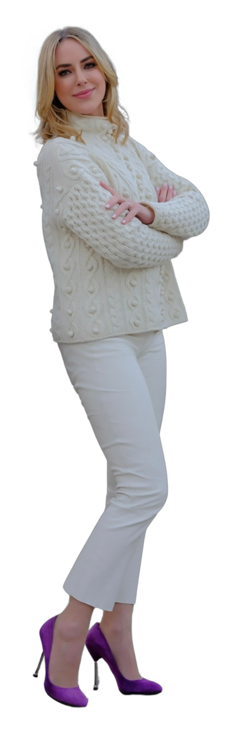 Dierdre Slavin, founder of Heddy, smiling with confidence in a stylish cream sweater, representing leadership, innovation, and expertise in medical aesthetics training.