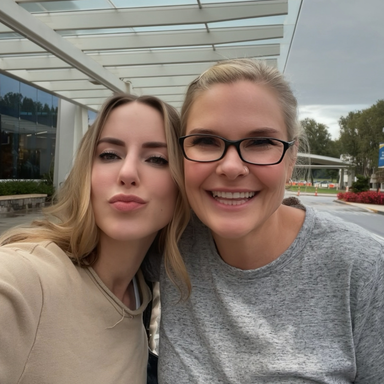 Founder & Ceo, Dierdre Slavin and Dr. Wendi Harper Lonabough smiling together outside in 2022, capturing their long-standing friendship and collaboration in medical aesthetics.