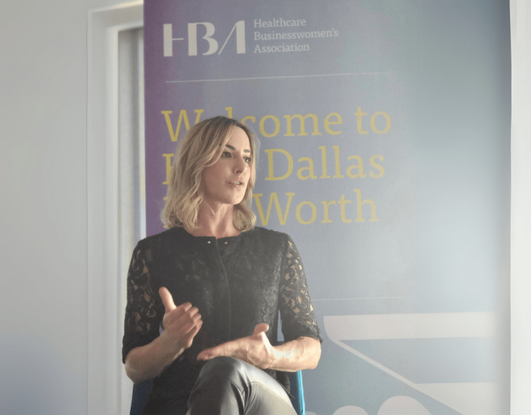 Dierdre Slavin speaking at Healthcare Businesswomen's Association Dallas-Fort Worth panel on medical aesthetics leadership and commercial strategy