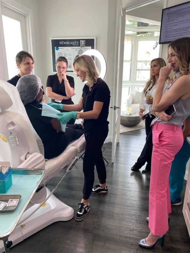 Dierdre Slavin leading a medical aesthetics clinical training session for injectors at a GPO practice event for PE-owned med spa groups