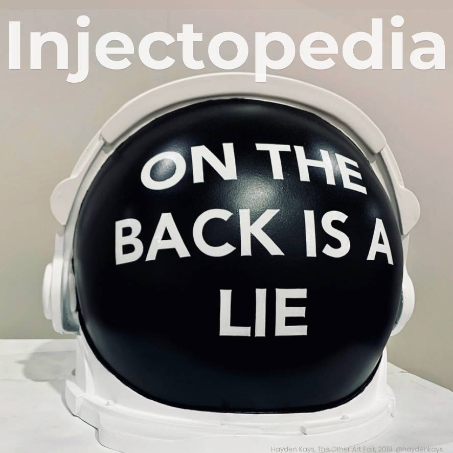 Black astronaut helmet with white text reading "On the back is a lie" by artist Hayden Kays, cover of Injectopedia Issue 5