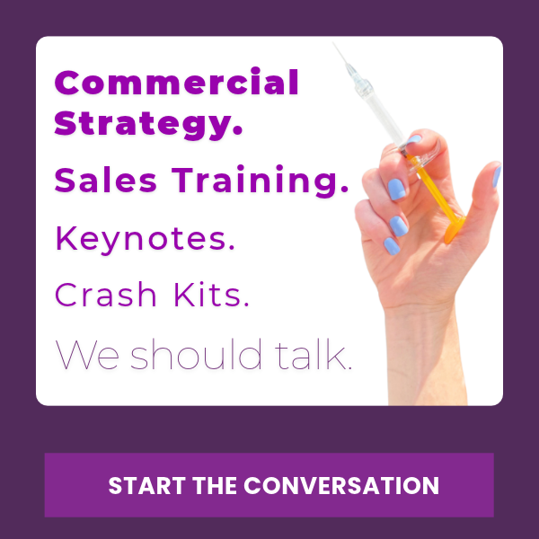 Heddy house ad listing commercial strategy, sales training, keynotes, and crash kits, with a hand holding a syringe and a Start the Conversation button